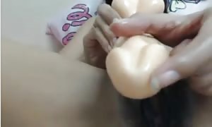 Thai female
, furry pussy drills herself with fake penis