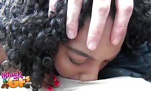 Curly-hair ebony gulping his succulent dick with closed eyes