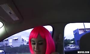 honey in pink wig having intensive sex in the car