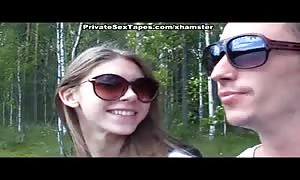 teenie couple walking in the woods drilled