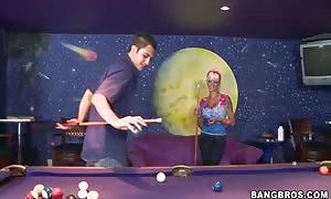 stunning beauty Delta White tempts
 a guy over pool game